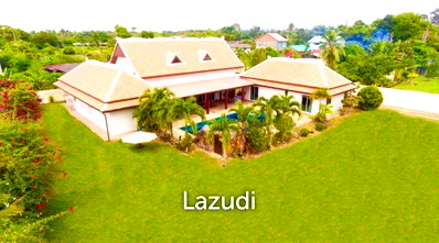Land for sale Pornprapanimit Road : 3 and a Half Rai | Land Plot with 2 Villas in Mabprachan