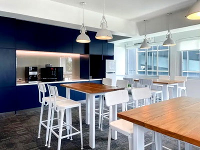 Office for rent Srinakharinwirot University Prasanmit Campus : Office for rent with modern coworking space, Blue Chips Thonglor Building. Inside is a modern lobby that opens up to a contemporary office space.