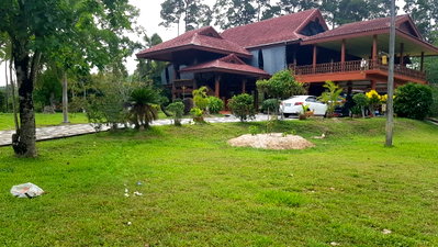 Houses for sale Lakchai Muang Yang Industrial Estate : Two-Storey Detached House for Sale in Ka Ched ,  Rayong   built entirely with golden teak wood, on a land area of 23 rai, 1 ngan, and 83.2 sq wah.