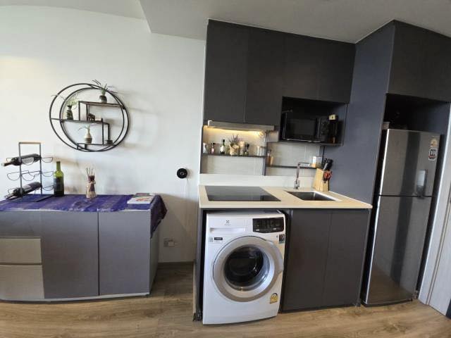 picture 1-Bedroom Sea View Condo for Sale at Andromeda Condominium - 7/12