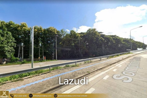 Land adjacent to the bridge and main road