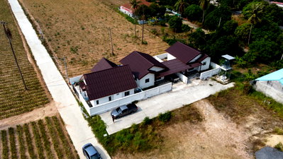 Houses for sale Nikhom Pattana Rayong : 🏡 One-story detached house next to a canal, friendly price, close to nature. Line @bzprOperty