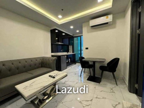 ขายห้องชุด 1 ห้องนอน  คอนโดมิเนียมอาร์คาเดีย มิลเลนเนียม ทาวเวอร์